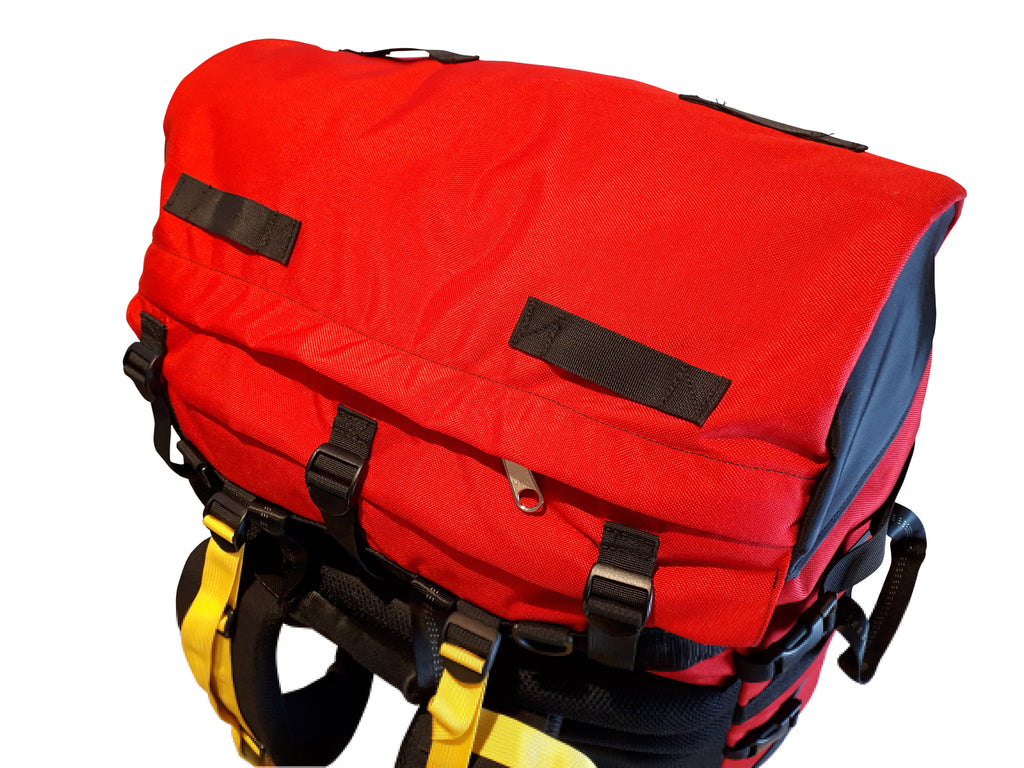 Red Ostrom Winisk Canoe Pack, Portage Pack lid zippered pocket top view, Canada, image.